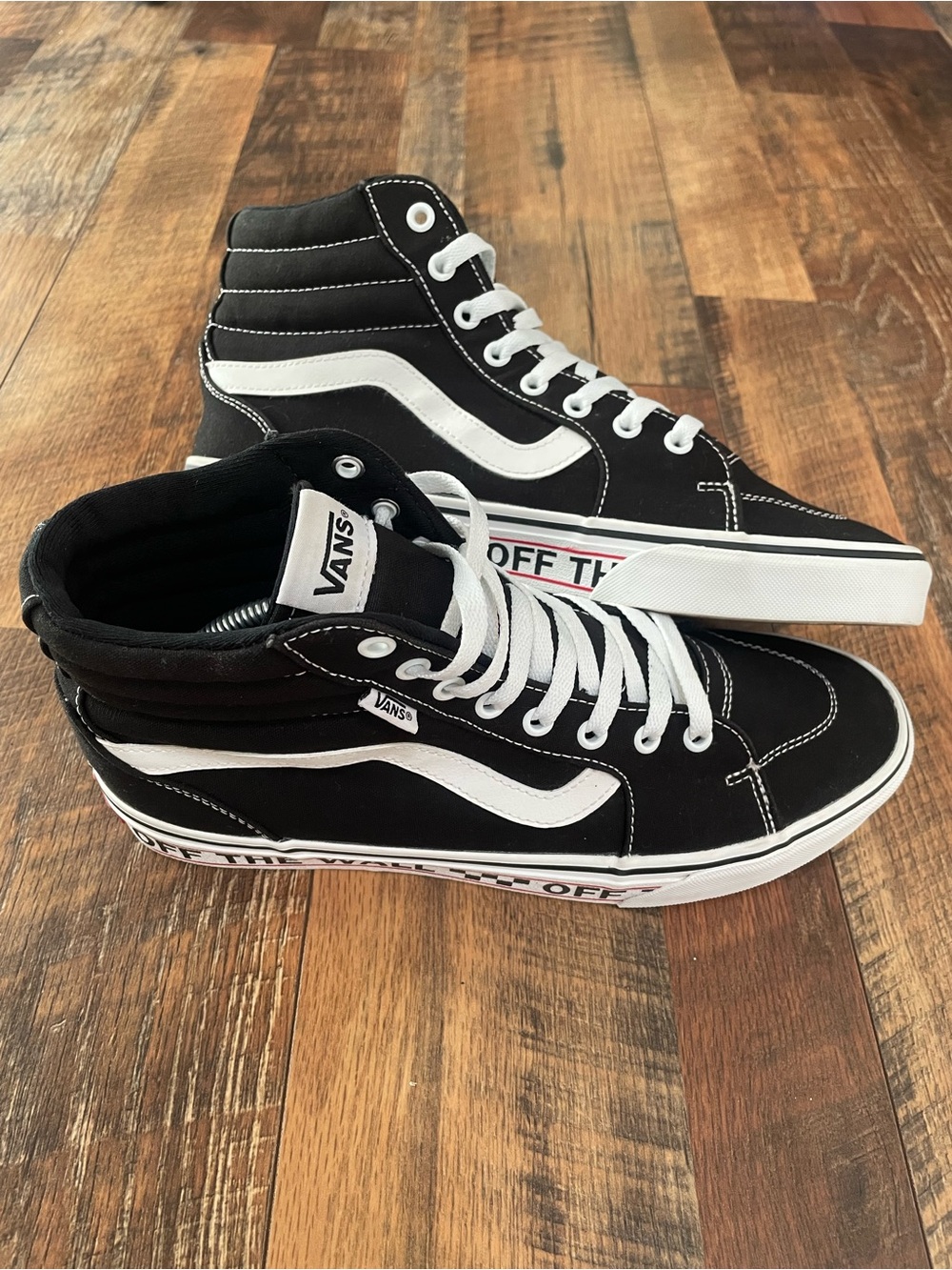 Vans Black and White High-Top Skate Sneakers